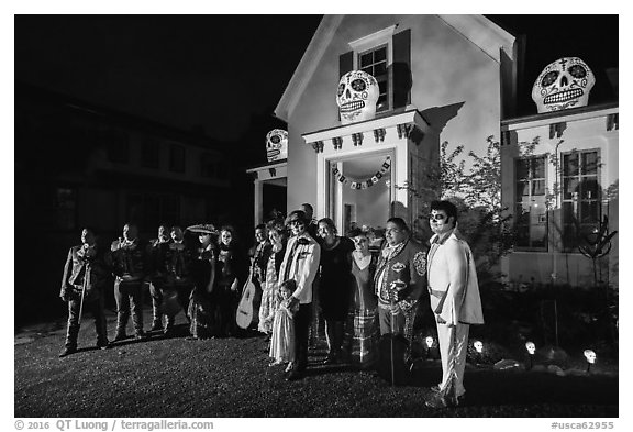 Family and guests pose in Halloween costumes. Petaluma, California, USA (black and white)