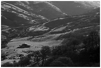 Distant view of barn in valley. Livermore, California, USA ( black and white)