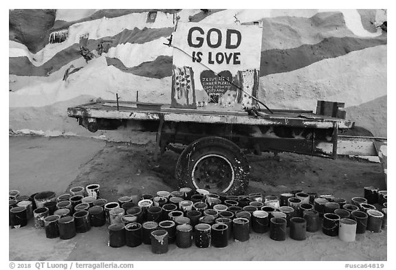 Paint and God is Love sign, Salvation Mountain. Nyland, California, USA (black and white)