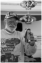 Man with mobile he made out of cans, Slab City. Nyland, California, USA ( black and white)