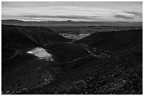 Interior of Amboy Crater with breach in the cinder cone rim at sunset. Mojave Trails National Monument, California, USA ( black and white)
