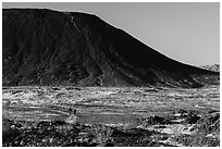 Hikers on Western Cone Trail, Amboy Crater. Mojave Trails National Monument, California, USA ( black and white)