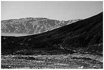 Amboy Crater slope and mountains. Mojave Trails National Monument, California, USA ( black and white)