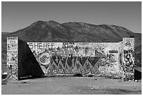 Abandonned building with graffiti along route 66. Mojave Trails National Monument, California, USA ( black and white)