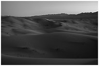 Dune ridges and Shiphole Mountains at dusk, Cadiz Dunes. Mojave Trails National Monument, California, USA ( black and white)