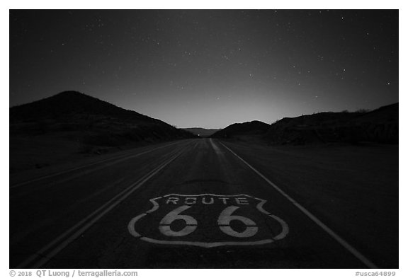 Historic Route 66 marker at night. Mojave Trails National Monument, California, USA (black and white)