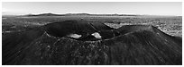 Aerial panoramic view of Amboy Crater and Bullion Mountains at sunrise. Mojave Trails National Monument, California, USA ( black and white)