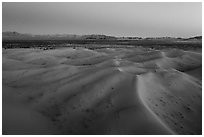 Aerial view of sand dunes and mountains at dusk, Cadiz Dunes. Mojave Trails National Monument, California, USA ( black and white)