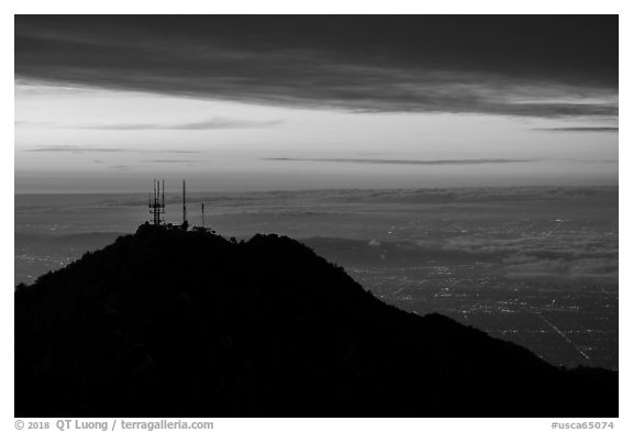 Mount Wilson antennas and Los Angeles with fog at sunrise. San Gabriel Mountains National Monument, California, USA (black and white)
