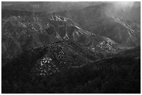 Rolling peaks with spot of light. San Gabriel Mountains National Monument, California, USA ( black and white)
