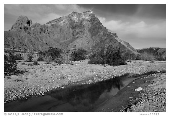 Colorful cliffs rise above the Mojave River in Afton Canyon. Mojave Trails National Monument, California, USA (black and white)