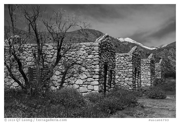 Ruined stone cabins and San Giorgono Mountain. Sand to Snow National Monument, California, USA (black and white)