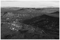 Aerial view of Black Lava Butte, boulders, and Flat Top Butte. Sand to Snow National Monument, California, USA ( black and white)