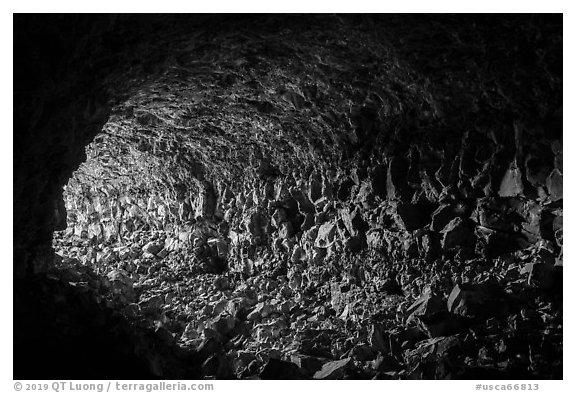 Looking out near entrance, Skull Cave. Lava Beds National Monument, California, USA (black and white)