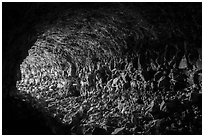 Looking out near entrance, Skull Cave. Lava Beds National Monument, California, USA ( black and white)