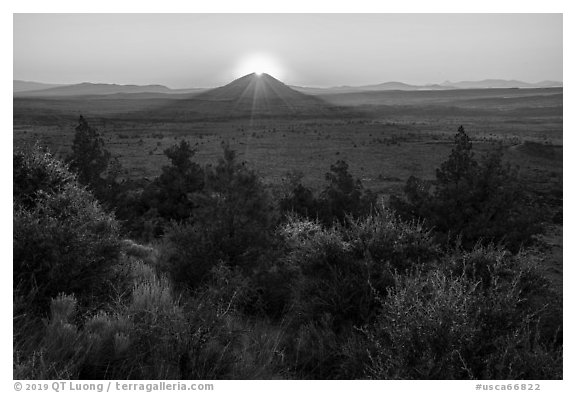 Whitney Butte with sun setting. Lava Beds National Monument, California, USA (black and white)
