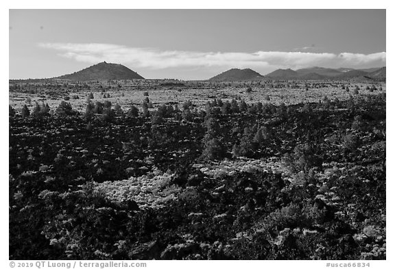Homestead Flow and volcanic buttes. Lava Beds National Monument, California, USA (black and white)