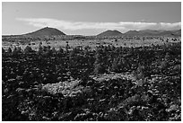 Homestead Flow and volcanic buttes. Lava Beds National Monument, California, USA ( black and white)