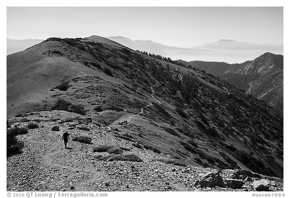Hiker and trail on Mount Baldy. San Gabriel Mountains National Monument, California, USA