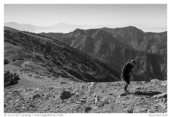Hiker on Mt Baldy's Devils Backbone. San Gabriel Mountains National Monument, California, USA (black and white)