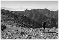 Hiker on Mt Baldy's Devils Backbone. San Gabriel Mountains National Monument, California, USA ( black and white)