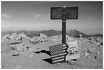 Sign and flags on Mt Baldy summit. San Gabriel Mountains National Monument, California, USA ( black and white)