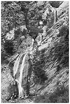 San Antonio Falls with family at the base. San Gabriel Mountains National Monument, California, USA ( black and white)