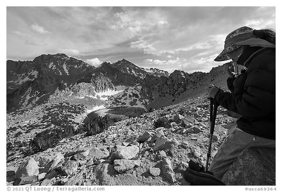 Hiker pauses above Big Pothole Lake, Inyo National Forest. California, USA (black and white)