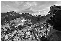 Hiker pauses above Big Pothole Lake, Inyo National Forest. California, USA ( black and white)