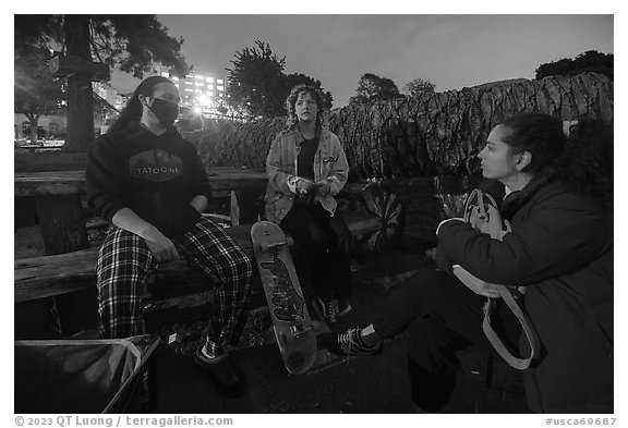 Conversation at night, Peoples Park. Berkeley, California, USA