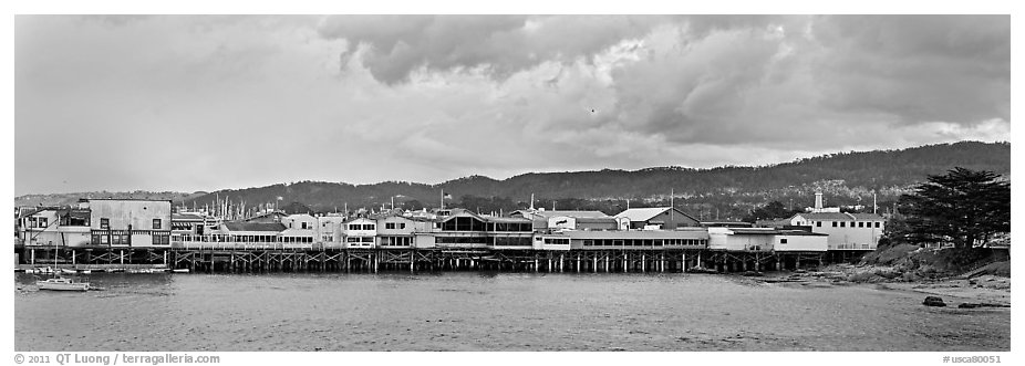 Fishermans Wharf colorful buildings at sunset. Monterey, California, USA (black and white)