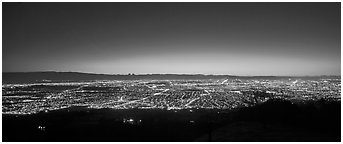 Lights of San Jose and Silicon Valley at sunset. San Jose, California, USA (Panoramic black and white)