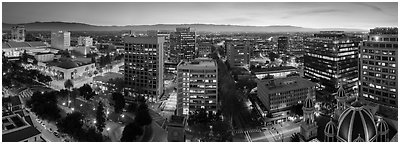 Downtown San Jose skyline and Santa Cruz Mountains at dusk. San Jose, California, USA (Panoramic black and white)