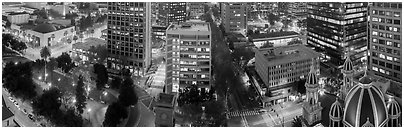 Downtown San Jose buildings after sunset. San Jose, California, USA (Panoramic black and white)