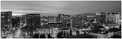 San Jose skyline at dusk from Adobe building to Fairmont hotel. San Jose, California, USA (Panoramic black and white)