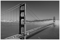 Golden Gate bridge and fog seen from Battery Spencer, afternoon. San Francisco, California, USA (black and white)