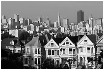 Victorians at Alamo Square and skyline, afternoon. San Francisco, California, USA (black and white)