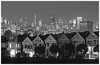 Victorians at Alamo Square and skyline, night. San Francisco, California, USA (black and white)