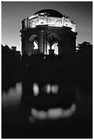 Rotunda of the Palace of Fine arts reflected in lagoon at  night. San Francisco, California, USA (black and white)