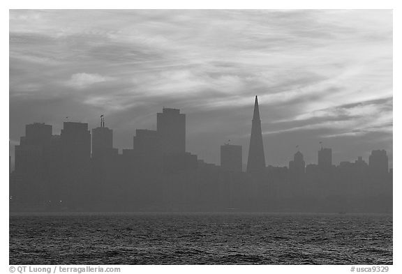 City skyline with sunset clouds seen from Treasure Island. San Francisco, California, USA