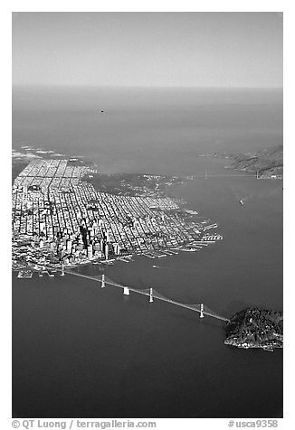 Aerial view of the Bay Bridge, the city, and  the Golden Gate Bridge. San Francisco, California, USA (black and white)