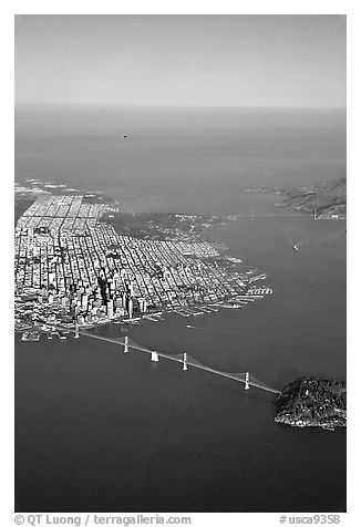 Aerial view of the Bay Bridge, the city, and  the Golden Gate Bridge. San Francisco, California, USA