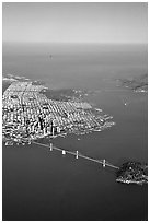 Aerial view of the Bay Bridge, the city, and  the Golden Gate Bridge. San Francisco, California, USA (black and white)