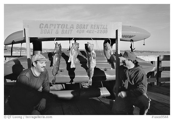 Fishermen with caught fish, Capitola. Capitola, California, USA