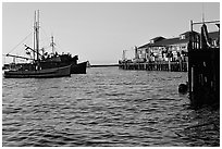 Fisherman's wharf at sunset. Monterey, California, USA ( black and white)