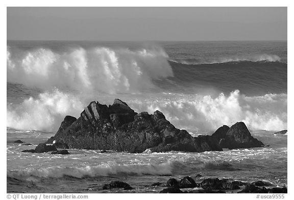 Crashing waves and rocks, Ocean drive. Pacific Grove, California, USA (black and white)