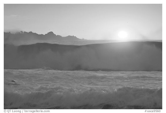 Crashing wave and sunset,  Carmel River State Beach. Carmel-by-the-Sea, California, USA (black and white)