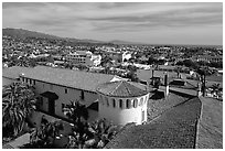 Red tile rooftops of the courthouse. Santa Barbara, California, USA (black and white)