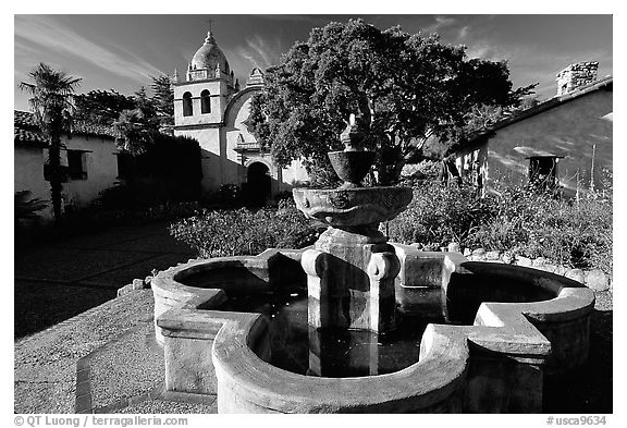 Fountain and chapel, Carmel Mission. Carmel-by-the-Sea, California, USA (black and white)