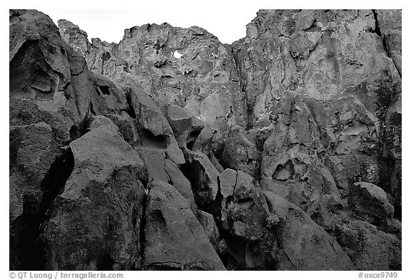 Cliff with hole, Hole-in-the-wall. Mojave National Preserve, California, USA (black and white)